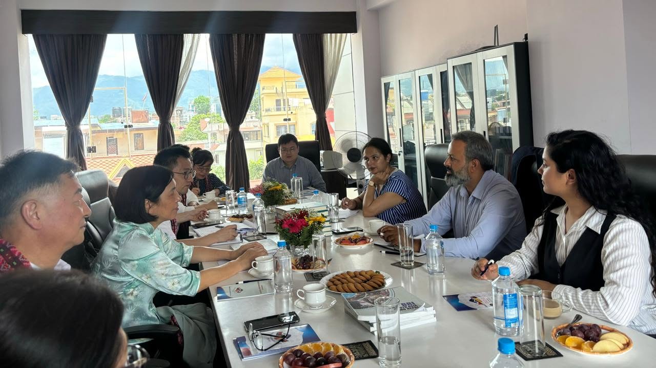 Nepali and Chinese delegates in a round-table working meeting on bilateral cooperation